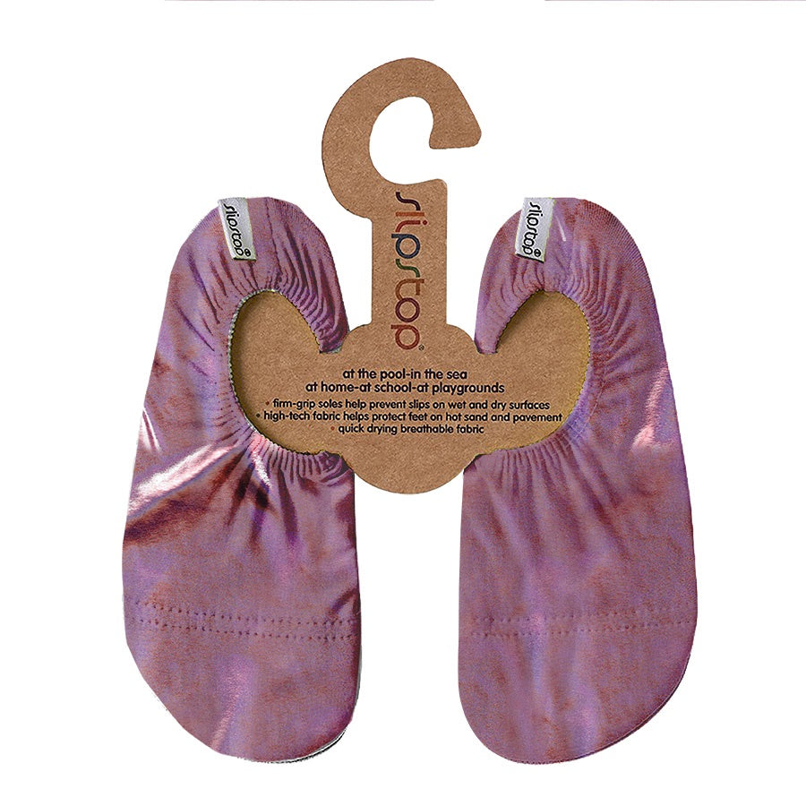 A pair of purple ABBEY JUNIOR water shoes for kids, displayed on a hanger, with a label showing the brand name.